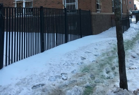 Snow Removal Violation image - snow covered sidewalk